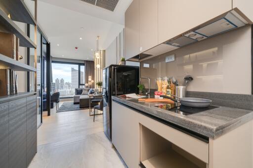 Modern kitchen with view into the living area