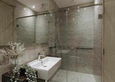 Modern bathroom with glass shower enclosure