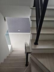 Modern staircase with decorative wall pattern