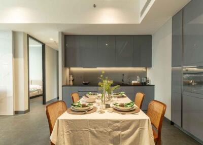 Modern kitchen with dining table and chairs