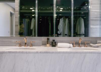 Modern bathroom with double sink and large mirror