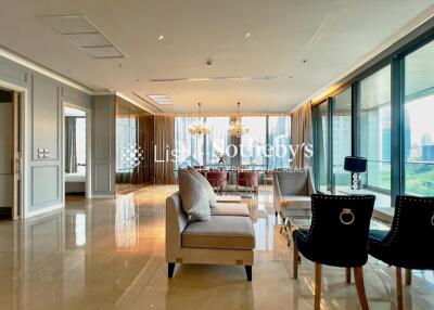 Spacious and luxurious living room with modern furniture and city view