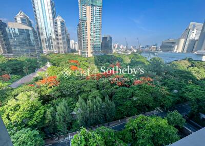 View of the cityscape with high-rise buildings and green park