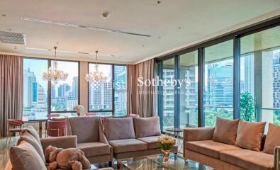 Modern living room with large windows and city view