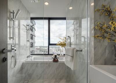 Modern bathroom with large window view and contemporary fixtures