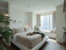 Bright and modern bedroom with a city view