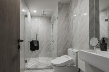 Modern bathroom with glass shower enclosure