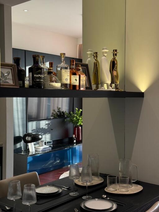 Stylish dining area with a view of kitchen and living room