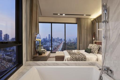 Luxurious bedroom with a city view, bathroom and large windows