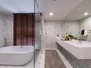 Modern bathroom with freestanding tub and large vanity mirror