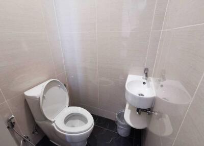 Small bathroom with toilet and sink