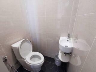 Small bathroom with toilet and sink