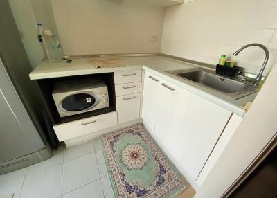 Small kitchen area with appliances