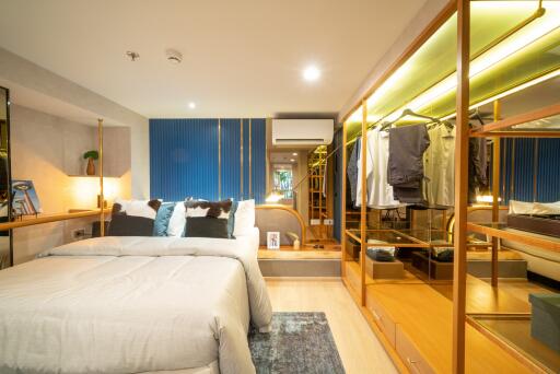 Modern bedroom with mirrored wardrobe and stylish decor