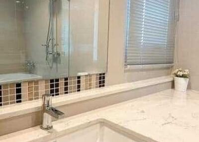 Modern bathroom with marble countertop