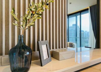 Living room with decorative elements and a city view