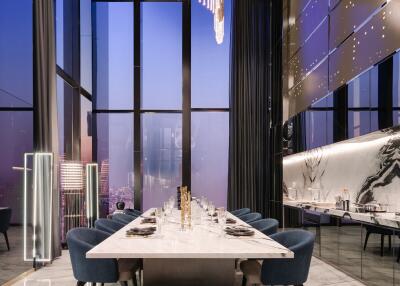 Modern dining room with large windows at Hampton Residence.