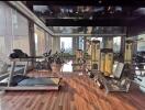 Luxurious home gym with modern equipment and city view