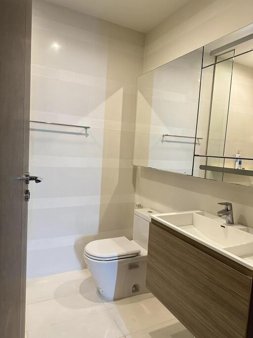 Modern bathroom with vanity and mirror