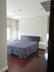 Neatly arranged bedroom with double bed and nightstands