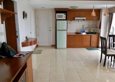 Kitchen with wooden cabinets and dining area