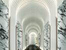 Modern corridor with marble walls and arches