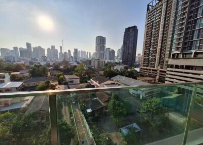 View from balcony of city skyline and buildings