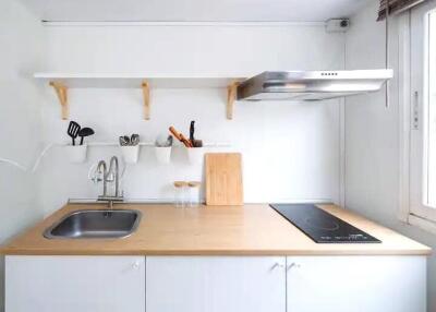 Modern kitchen with countertop and cooking area