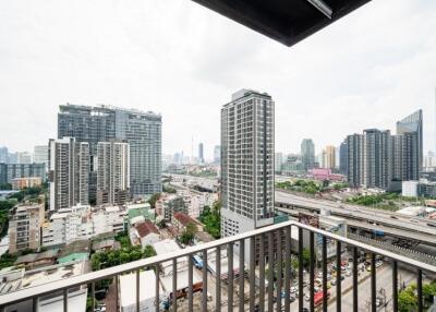 City view from a balcony in a high-rise building