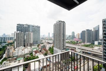 City view from a balcony in a high-rise building