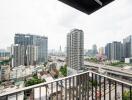 City view from a balcony in a high-rise building