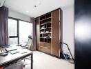 Modern home office with wooden bookshelf, desk, and city view