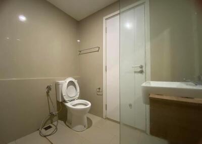 Modern bathroom with toilet and shower