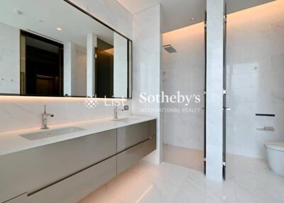 Modern bathroom with large mirror and double sinks