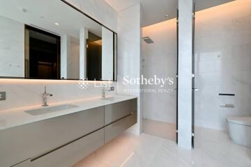 Modern bathroom with large mirror and double sinks