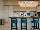 Modern kitchen with island and chandelier