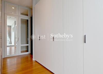 Spacious hallway with built-in wardrobes