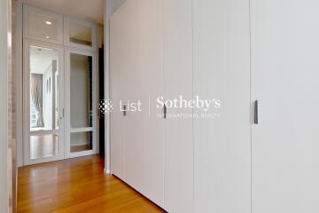 Spacious hallway with built-in wardrobes