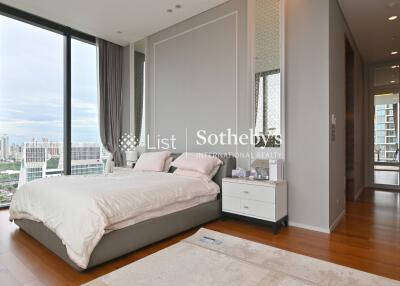 Spacious bedroom with city view