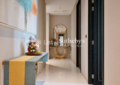 Elegant hallway with artistic decor and mirrors