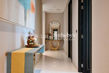 Elegant hallway with artistic decor and mirrors