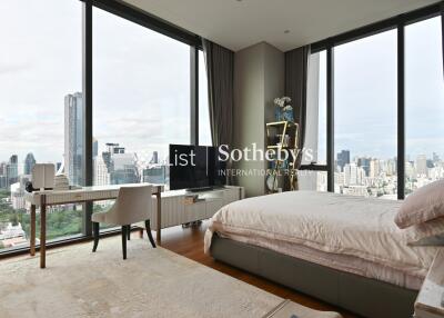 Modern bedroom with city skyline view