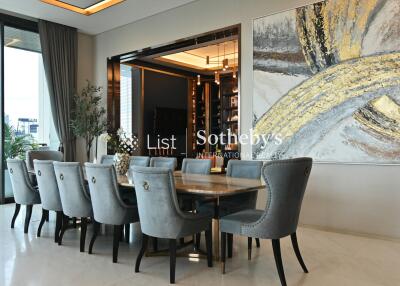 Luxury dining room with elegant decor and modern art