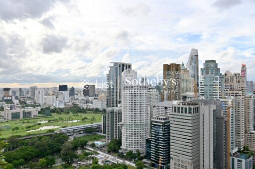 City skyline with view of multiple skyscrapers and a golf course