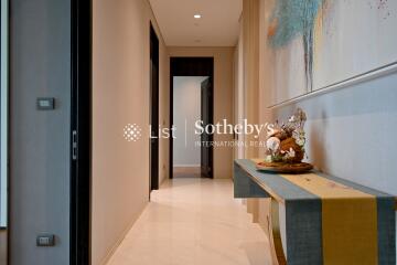 Modern hallway with decorative artwork and sleek console table