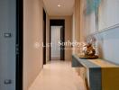 Modern hallway with decorative artwork and sleek console table