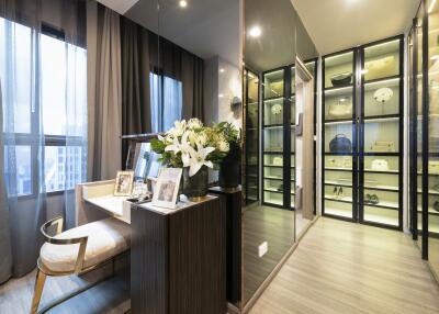 Modern bedroom with mirrored wardrobe and vanity desk