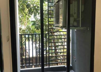 Small balcony with sliding glass door