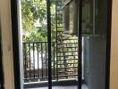 Small balcony with sliding glass door