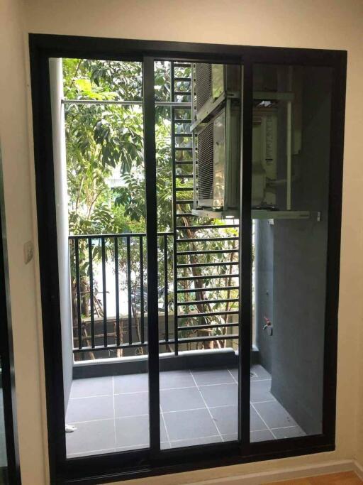 Small balcony with sliding glass door